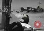 Image of Evacuating wounded United States soldiers from Omaha Beach Normandy France, 1944, second 38 stock footage video 65675060432