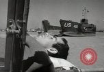 Image of Evacuating wounded United States soldiers from Omaha Beach Normandy France, 1944, second 40 stock footage video 65675060432