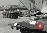 Image of Evacuating wounded United States soldiers from Omaha Beach Normandy France, 1944, second 41 stock footage video 65675060432