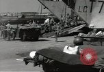 Image of Evacuating wounded United States soldiers from Omaha Beach Normandy France, 1944, second 42 stock footage video 65675060432