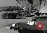 Image of Evacuating wounded United States soldiers from Omaha Beach Normandy France, 1944, second 43 stock footage video 65675060432