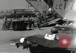Image of Evacuating wounded United States soldiers from Omaha Beach Normandy France, 1944, second 45 stock footage video 65675060432