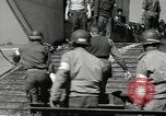 Image of Evacuating wounded United States soldiers from Omaha Beach Normandy France, 1944, second 57 stock footage video 65675060432