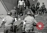 Image of Evacuating wounded United States soldiers from Omaha Beach Normandy France, 1944, second 58 stock footage video 65675060432