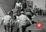 Image of Evacuating wounded United States soldiers from Omaha Beach Normandy France, 1944, second 59 stock footage video 65675060432