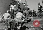 Image of Evacuating wounded United States soldiers from Omaha Beach Normandy France, 1944, second 60 stock footage video 65675060432