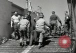 Image of Evacuating wounded United States soldiers from Omaha Beach Normandy France, 1944, second 62 stock footage video 65675060432