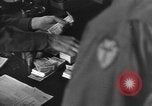 Image of finance officer France, 1944, second 37 stock footage video 65675060476