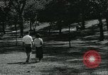 Image of 1930s young dating couple Kansas City Kansas USA, 1935, second 19 stock footage video 65675060556