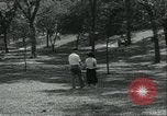 Image of 1930s young dating couple Kansas City Kansas USA, 1935, second 21 stock footage video 65675060556