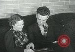 Image of 1930s young dating couple Kansas City Kansas USA, 1935, second 26 stock footage video 65675060556