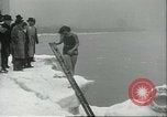 Image ice-parsemé de l'eau Chicago Illinois USA, 1935, de la seconde 10 séquences d'archives historiques vidéo 65675060567