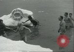 Image ice-parsemé de l'eau Chicago Illinois USA, 1935, de la seconde 20 séquences d'archives historiques vidéo 65675060567