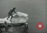 Image ice-parsemé de l'eau Chicago Illinois USA, 1935, de la seconde 26 séquences d'archives historiques vidéo 65675060567