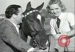 Image of screen stars Santa Monica California USA, 1936, second 30 stock footage video 65675060570