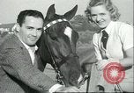 Image of screen stars Santa Monica California USA, 1936, second 32 stock footage video 65675060570