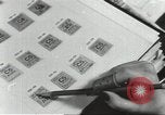 Image of counterfeit ration stamps United States USA, 1943, second 14 stock footage video 65675060590