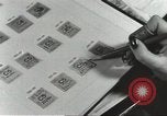 Image of counterfeit ration stamps United States USA, 1943, second 25 stock footage video 65675060590