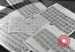 Image of counterfeit gasoline stamps United States USA, 1943, second 5 stock footage video 65675060591