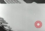 Image of counterfeit gasoline stamps United States USA, 1943, second 6 stock footage video 65675060591