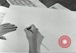 Image of counterfeit gasoline stamps United States USA, 1943, second 9 stock footage video 65675060591