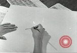 Image of counterfeit gasoline stamps United States USA, 1943, second 10 stock footage video 65675060591