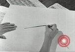 Image of counterfeit gasoline stamps United States USA, 1943, second 13 stock footage video 65675060591