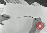 Image of counterfeit gasoline stamps United States USA, 1943, second 14 stock footage video 65675060591