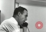 Image Station de gaz avec vente livre ration en temps de guerre United States USA, 1943, de la seconde 31 séquences d'archives historiques vidéo 65675060592