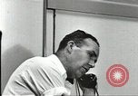Image Station de gaz avec vente livre ration en temps de guerre United States USA, 1943, de la seconde 33 séquences d'archives historiques vidéo 65675060592