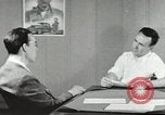 Image Station de gaz avec vente livre ration en temps de guerre United States USA, 1943, de la seconde 52 séquences d'archives historiques vidéo 65675060592