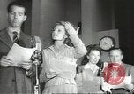 Image of Famous Hollywood personalities prepare for broadcast Hollywood Los Angeles California USA, 1943, second 1 stock footage video 65675060595