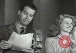 Image of Famous Hollywood personalities prepare for broadcast Hollywood Los Angeles California USA, 1943, second 31 stock footage video 65675060595