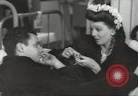 Immagine di L'attrice Loretta Young Los Angeles California USA, 1943, secondo 59 filmato di repertorio 65675060609
