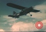 Image of L-5 Sentinel aircraft in Alpine region of France Annecy France, 1944, second 10 stock footage video 65675060620
