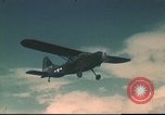 Image of L-5 Sentinel aircraft in Alpine region of France Annecy France, 1944, second 11 stock footage video 65675060620