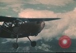 Image of L-5 Sentinel aircraft in Alpine region of France Annecy France, 1944, second 46 stock footage video 65675060620