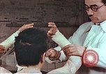 Standbild Handaufzug von Atombombe Hiroshima Japan, 1946, aus Sekunde 5 historischem Filmmaterial Videoclip 65675060686