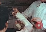 Standbild Handaufzug von Atombombe Hiroshima Japan, 1946, aus Sekunde 14 historischem Filmmaterial Videoclip 65675060686