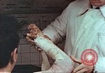 Standbild Handaufzug von Atombombe Hiroshima Japan, 1946, aus Sekunde 23 historischem Filmmaterial Videoclip 65675060686