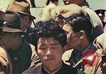 Standbild japanische Arbeiter Tokio Japan, 1946, aus Sekunde 30 historischem Filmmaterial Videoclip 65675060703