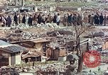 Image of Japanese citizens in poverty after World War 2 defeat Tokyo Japan, 1945, second 7 stock footage video 65675060711