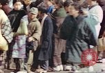 Image of Japanese citizens in poverty after World War 2 defeat Tokyo Japan, 1945, second 38 stock footage video 65675060711