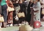 Image of Japanese citizens in poverty after World War 2 defeat Tokyo Japan, 1945, second 41 stock footage video 65675060711