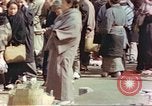 Image of Japanese citizens in poverty after World War 2 defeat Tokyo Japan, 1945, second 42 stock footage video 65675060711