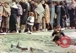 Image of Japanese citizens in poverty after World War 2 defeat Tokyo Japan, 1945, second 49 stock footage video 65675060711