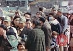 Image of Japanese citizens in poverty after World War 2 defeat Tokyo Japan, 1945, second 56 stock footage video 65675060711