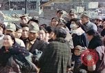 Image of Japanese citizens in poverty after World War 2 defeat Tokyo Japan, 1945, second 58 stock footage video 65675060711