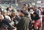 Image of Japanese citizens in poverty after World War 2 defeat Tokyo Japan, 1945, second 59 stock footage video 65675060711