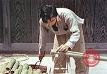 Standbild japanische Arbeiter Kyoto Japan, 1946, aus Sekunde 8 historischem Filmmaterial Videoclip 65675060731